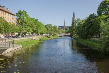 Gorgeous view on town street with cathedral on background. Tourism, travel concept. Europe, Sweden, Uppsala.