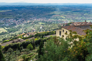Fototapeta na wymiar Landscape of Tuscan countryside viewed from Girifalco fortress on the hilltop overlooking Cortona, Tuscany, Italy