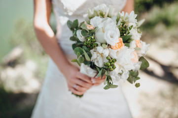 wedding bouquet in bride's hands, david austin