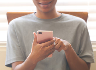 Black / African American girl using phone