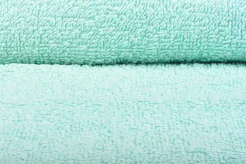 Light green terry towel. The texture of the cloth towels.