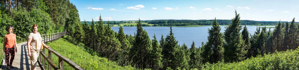 Two middle-aged women resting in the Park