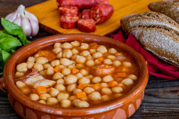 Chickpea dish on wooden background