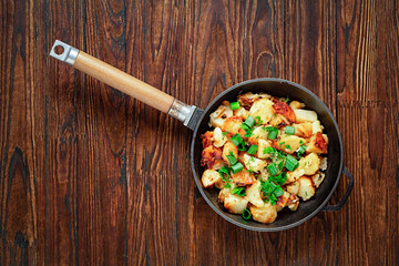 Fried potatoes, breakfast potatoes, cast iron, mashed potato, stock photo, in a frying pan, onions,...