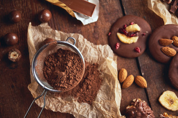 Obraz na płótnie Canvas Organic homemade chocolate and cocoa beeens