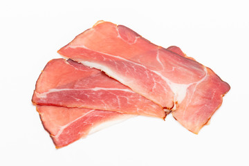 Hamon sliced on white background. Spanisch traditional meat.