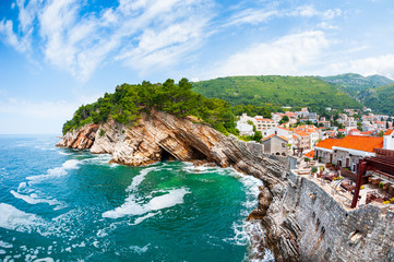 View of the cliffs from Castello fortress in Petrovac, Montenegro. Famous travel destination - obrazy, fototapety, plakaty