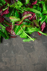 Healthy salad, leaves mix salad (mix micro greens, juicy snack, tomato). food background - Image