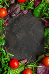 Healthy salad, leaves mix salad (mix micro greens, juicy snack, tomato). food background - Image