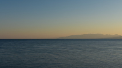 Beautiful sunset on the sea, quiet cozy evening at the seaside