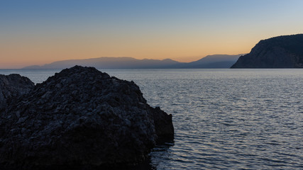 Beautiful sunset on the sea, quiet cozy evening at the seaside