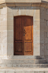 stone stairs and wooden door