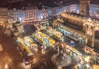 Krakow Poland main square with cloth hall and Christmas fairs aerial view