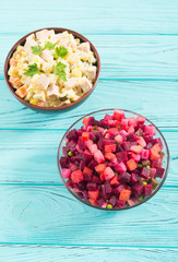 Traditional Russian salad olivier andvinaigrette