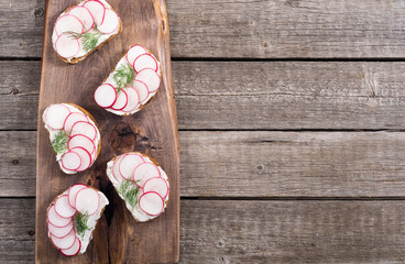 Healthy vegetable toasts sandwith with radish and dill