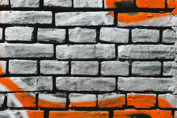Brick rough wall on the street