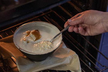 Tasty millet porridge on milk cooked in a pot in the oven
