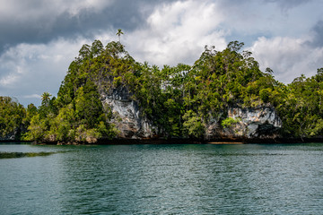 Waigeo, Kri, Mushroom Island, group of small islands in shallow blue lagoon water, Raja Ampat, West Papua, Indonesia