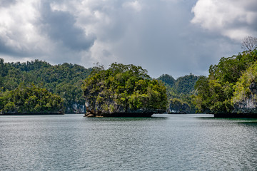 Waigeo, Kri, Mushroom Island, group of small islands in shallow blue lagoon water, Raja Ampat, West Papua, Indonesia