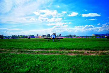 Fototapeta na wymiar Dramatic airplane at countryside airport background hd