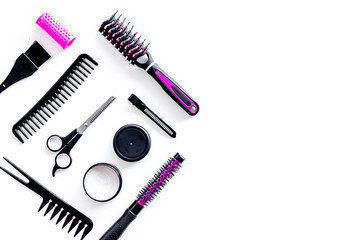 Set of professional hairdresser tools with combs and sciccors on white background top view mock up