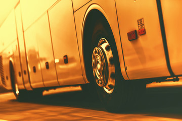 golden luxury bus coach doing voyage by high speed