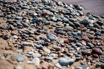 water texture with reflections and rocks on the bottom of stream