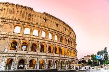 Fototapeta na wymiar Colosseum, or Coliseum. Illuminated huge Roman amphitheatre early in the morning, Rome, Italy