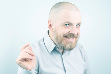portrait of a bearded happy man. joy in every day of life.