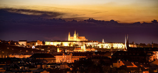 Fototapeta na wymiar Prague cityscape by night with illuminated Prague Castle