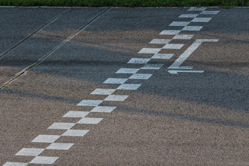 Racing track finish line. Signs on a finish line.