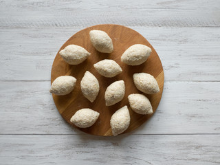 Raw Kibbeh. Cooking of Arabic meat appetizer Kibbeh.