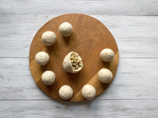 Raw Kibbeh. Cooking of Arabic meat appetizer Kibbeh.