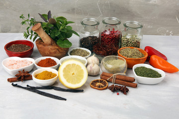 Spices and herbs on table. Food and cuisine ingredients with basil