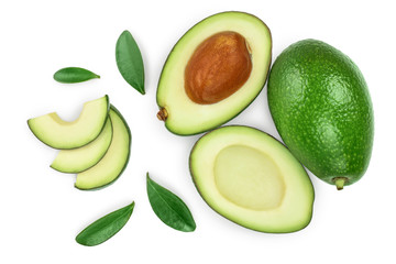 avocado and slices decorated with green leaves isolated on white background. Top view. Flat lay