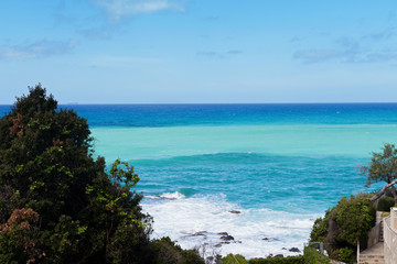 Beautiful azure sea and the rocky beach