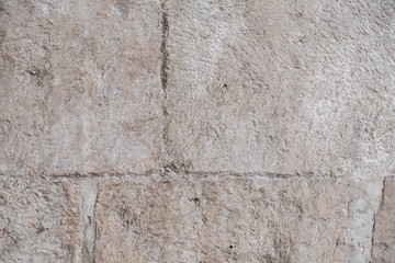 old antique stone wall. wall of large pieces of stone. background - stone wall