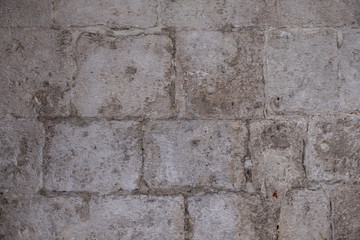 old antique stone wall. wall of large pieces of stone. background - stone wall