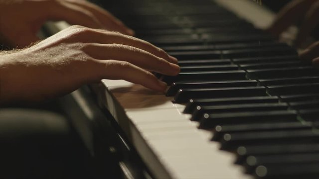 Playing Piano Hands Close Up dolly slider shot. Grand piano. Shot on Red Epic