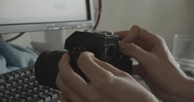Automatic film rewinding on Nikon 35mm camera
