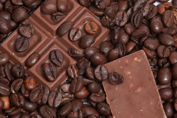 Pieces of dark chokolate and coffee beans