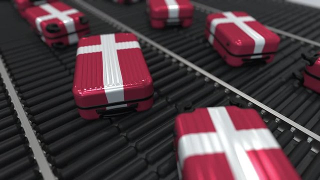 Many travel suitcases featuring flag of Denmark. Danish tourism conceptual animation
