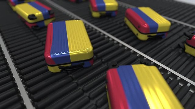 Many travel suitcases featuring flag of Colombia. Colombian tourism conceptual animation