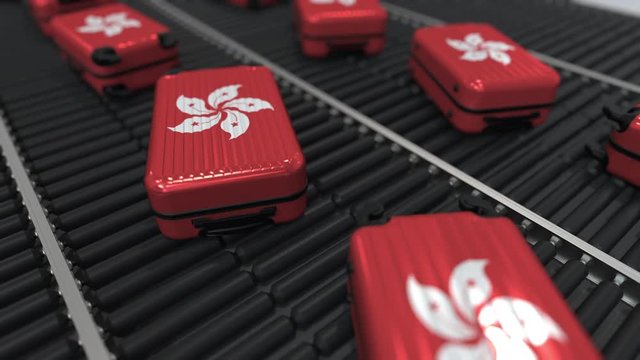 Many travel suitcases featuring flag of Hong Kong. Tourism conceptual animation