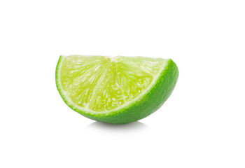 Juicy slice of lime isolated on white background.