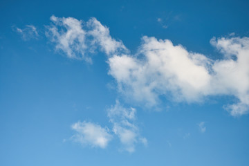 Blue sky background with white clouds