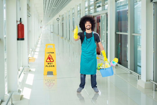 Afro Janitor Show Thumbs Up In The Train Station