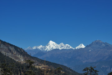 Fototapeta na wymiar A view of Jomolhari 7326m in Bhutan through an idyllic valley