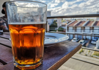 A red beer in the balcony