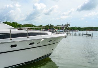 Fototapeta premium Speedboats docking at pier in Phuket